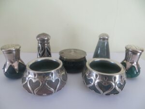 Liberty and Co 'cymric' range of smalls, incorporating Ruskin bodies circa 1900/1.