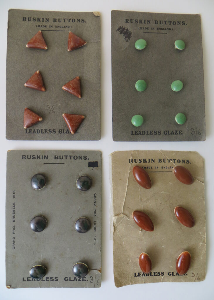 Ruskin buttons on factory cards.