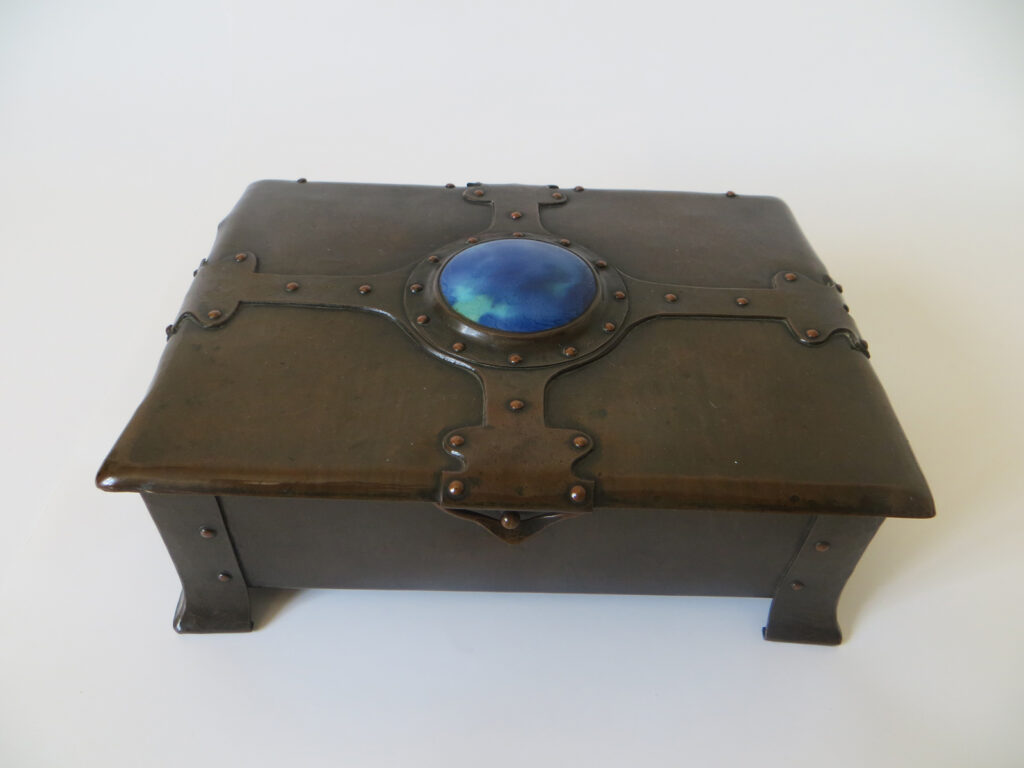 A. E. Jones copper casket with Ruskin enamel.