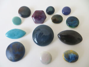 Ruskin enamel buttons, various shapes.