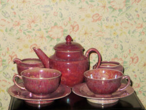 Tea set in pink lustre glaze.