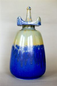 Large crystalline scent bottle with a drop-in lid.